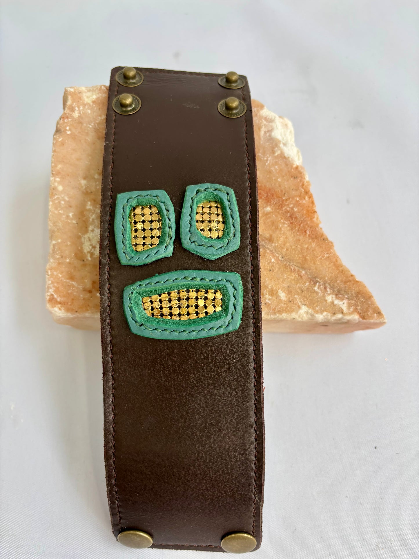 Brown and green leather cuff with gold