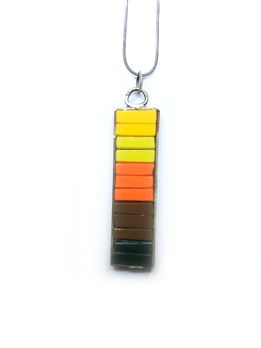 The 80's Glass  mosaic pendant in brass bevel setting