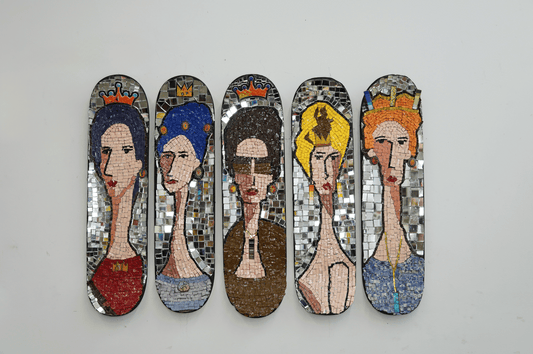 mosaic on skateboard of five sophisticated women with jewelry and elongated faces