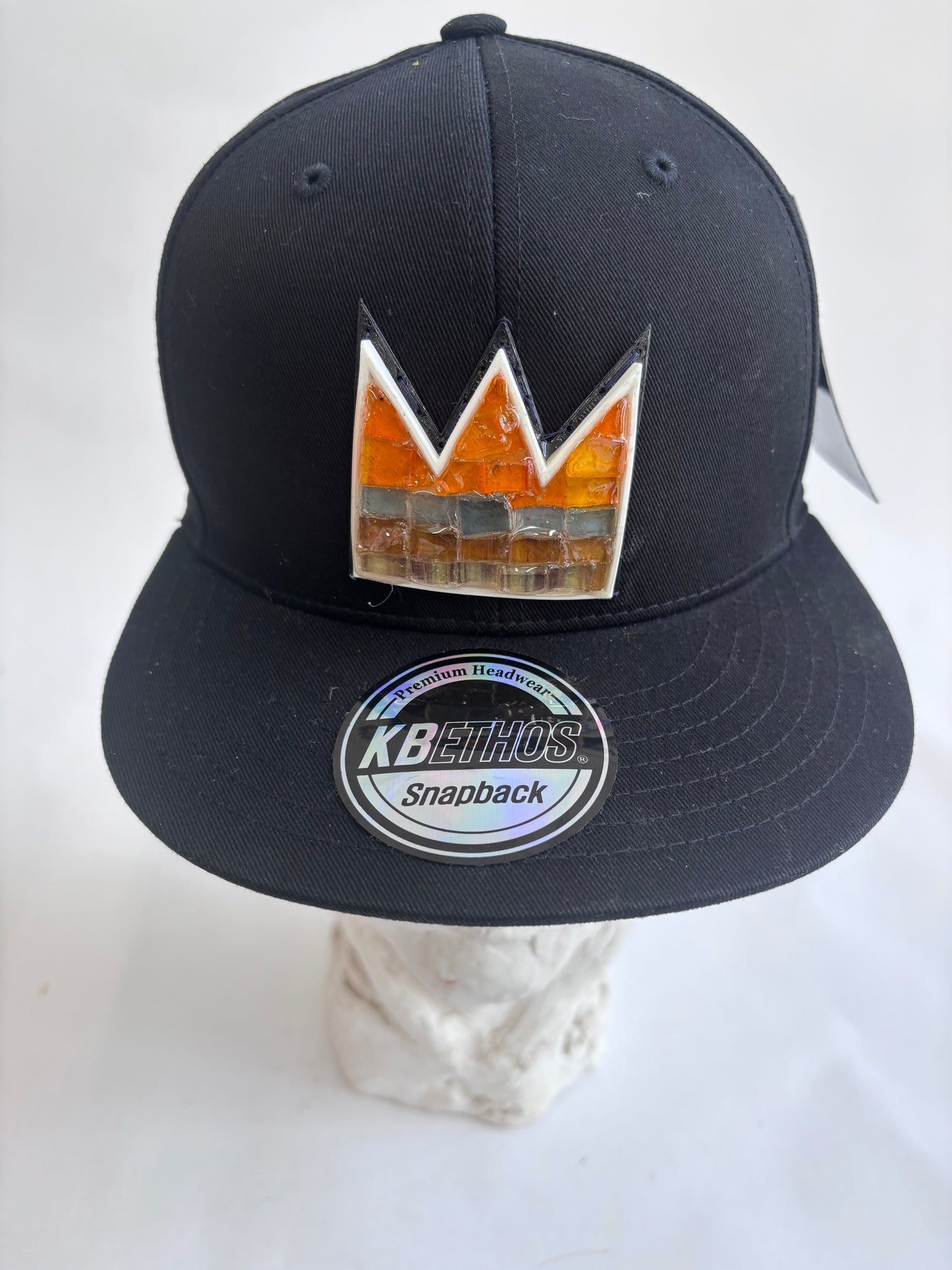 Adjustable black 6 panel baseball cap with gray Orange Mosaic Basquiat crown