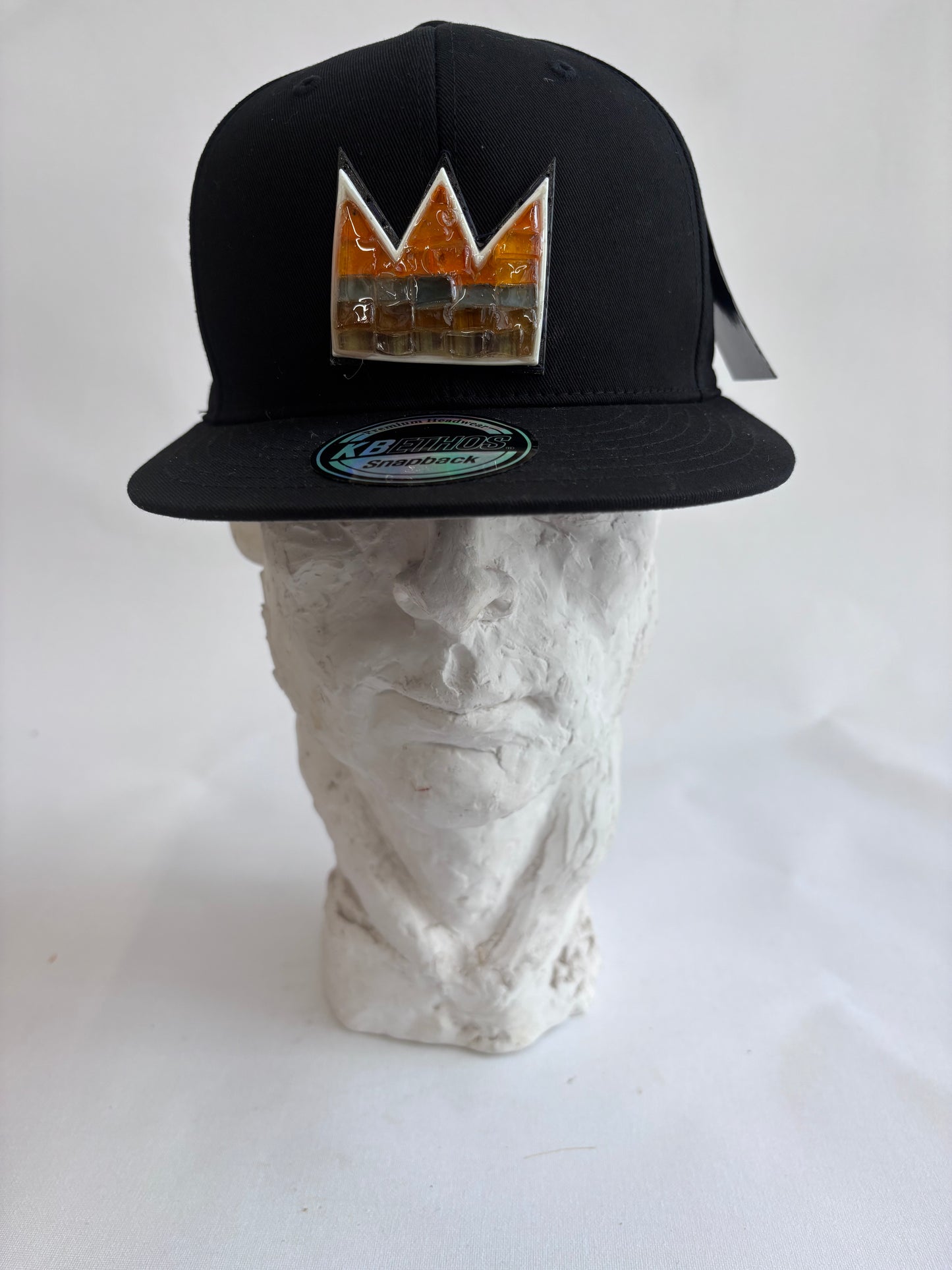 Adjustable black 6 panel baseball cap with gray Orange Mosaic Basquiat crown