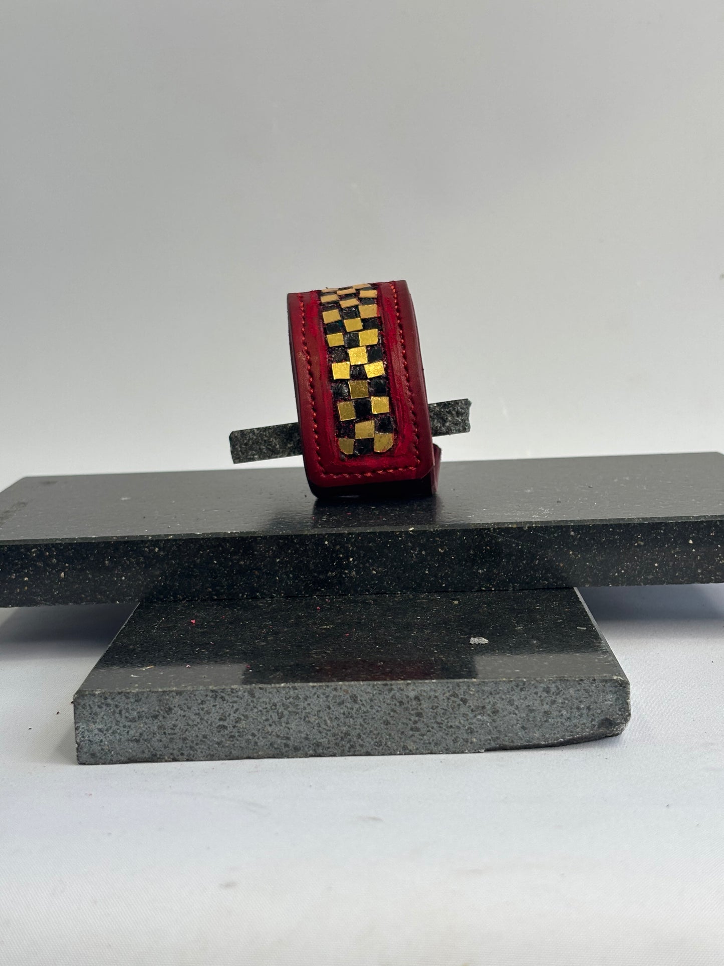 Red leather gold and black glass inlaid leather Cuff