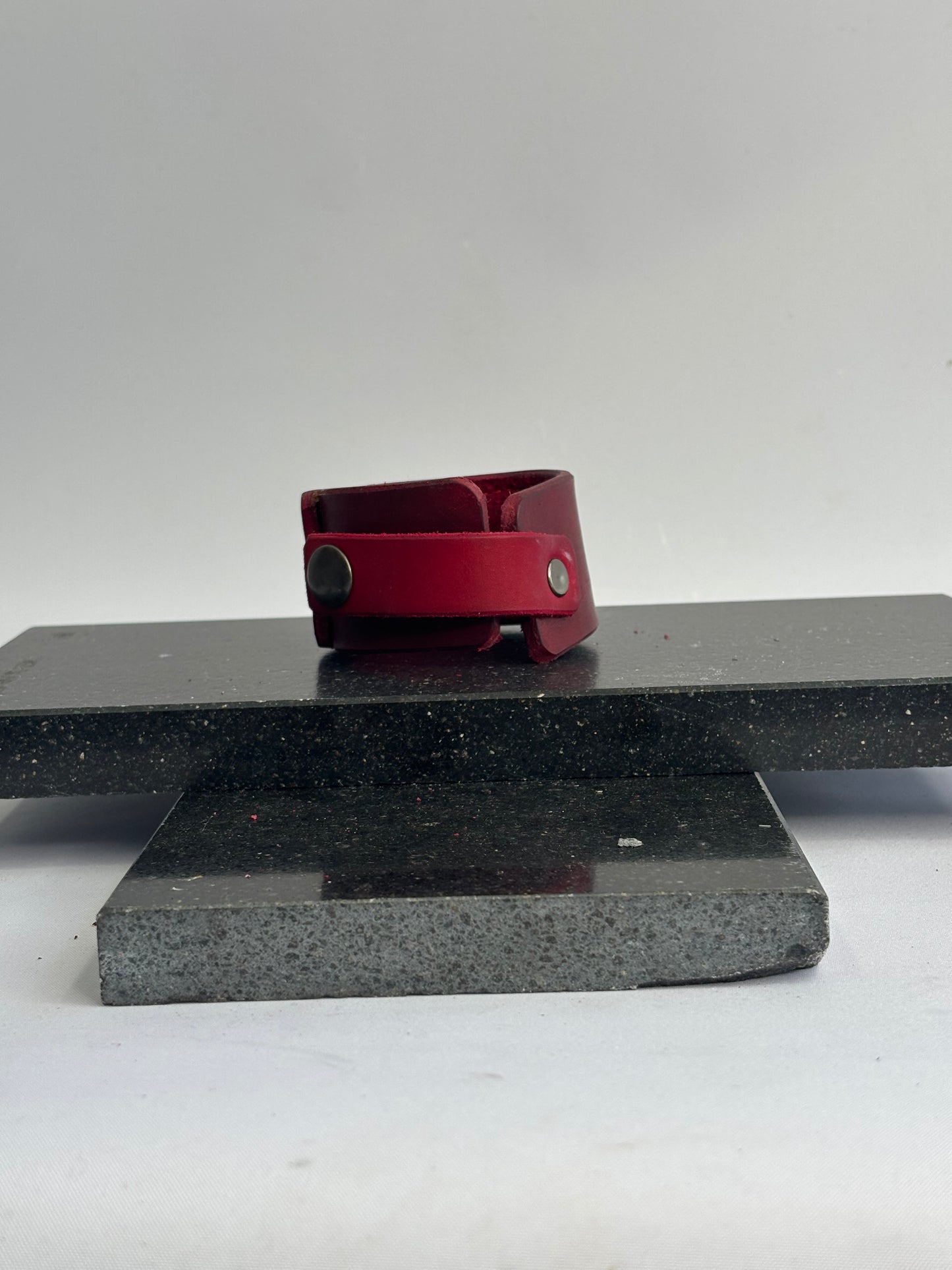 Red leather gold and black glass inlaid leather Cuff