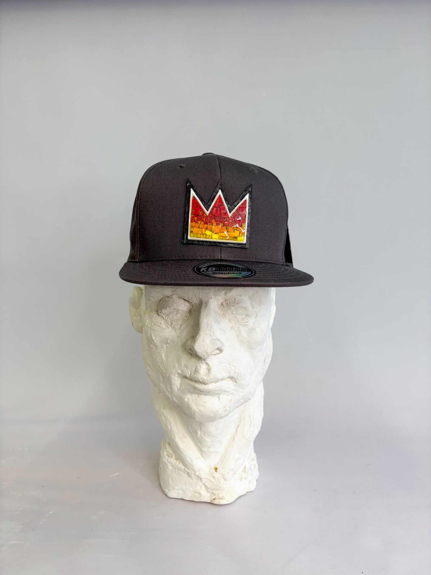 Gray six panel baseball hat with Italian glass mosaic of Basquiat Crown