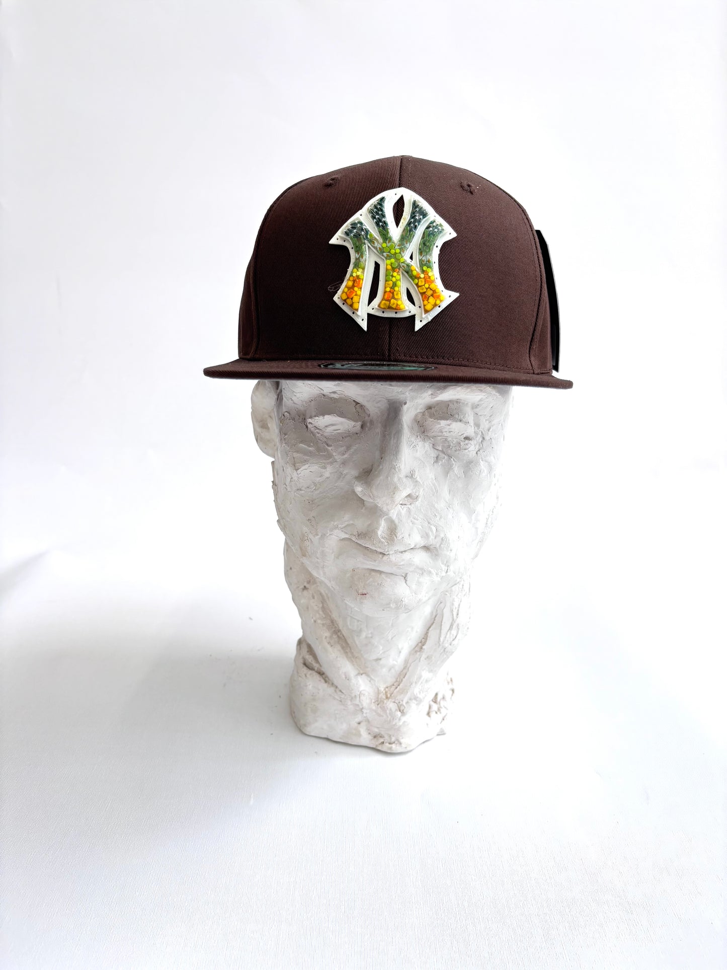 New York Yankees adjustable snapback hat with a handcrafted glass micro mosaic logo. One-size-fits-most. Bold, unique, fan-ready.