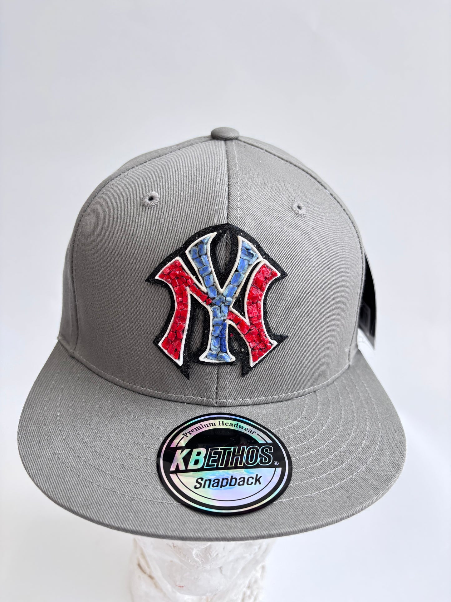 New York Yankees adjustable snapback hat with a handcrafted glass micro mosaic logo. One-size-fits-most. Bold, unique, fan-ready.