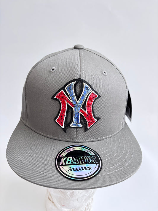 New York Yankees adjustable snapback hat with a handcrafted glass micro mosaic logo. One-size-fits-most. Bold, unique, fan-ready.