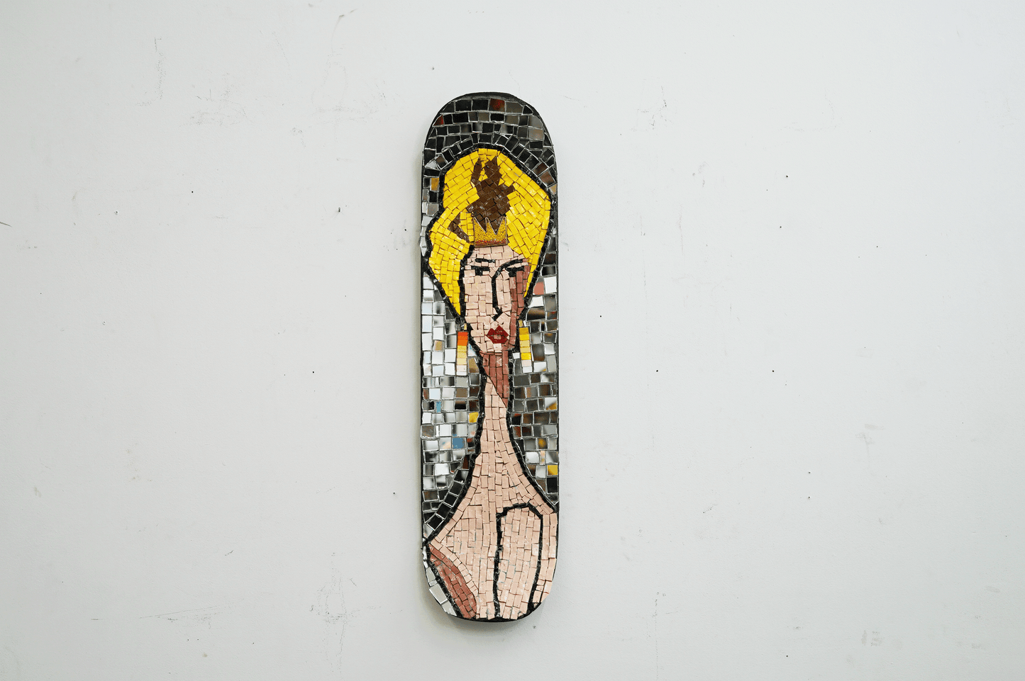 Decorative mosaic on a skateboard  deck of cz guest