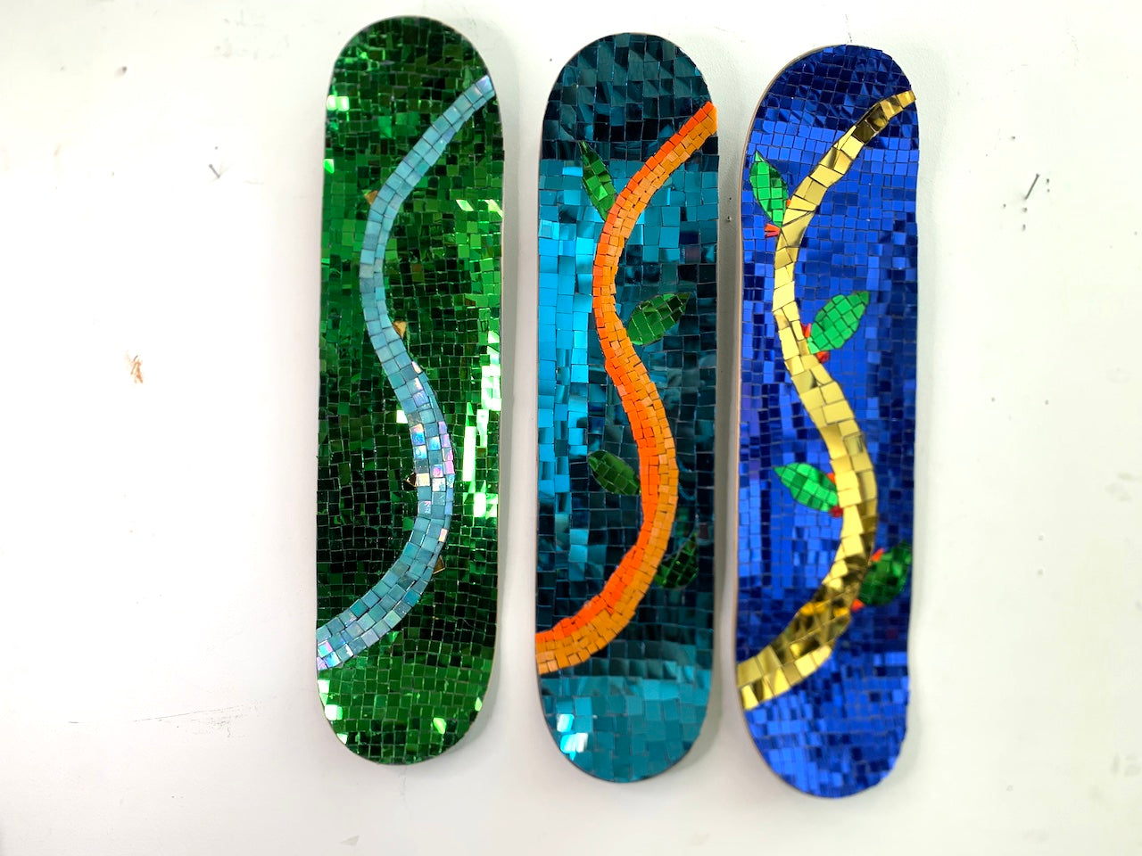 set of 3 skateboards decks with Thai mirror glass depicting spring